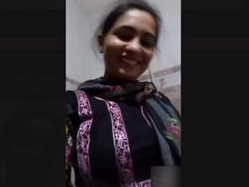 Pretty young girl showcases her beauty in a lez video