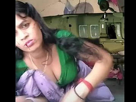 Atashi Roy, the sultry housewife, flaunts her cleavage and belly button