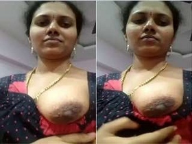 Desi wife flaunts her big tits in front of camera