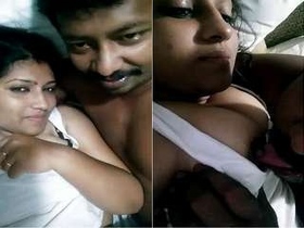 Tamil wife gives husband a breast massage