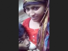 Debar gives oral pleasure to Bhabi's rural bosom in a countryside setting