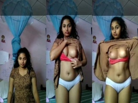 Cute girlfriend records herself undressing for her boyfriend