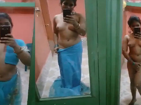 Hot girl seductively strips and takes seductive selfies