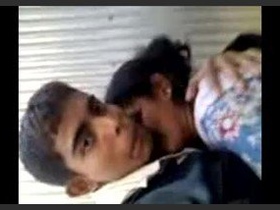A young woman from Bihar with large breasts is playfully fondled