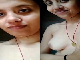 Rural girl flaunts her breasts in front of camera for partner