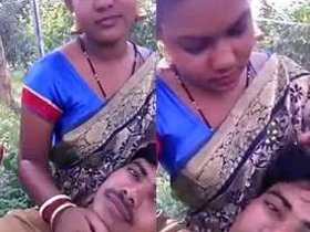 Passionate Indian couple shares romantic moments in the park