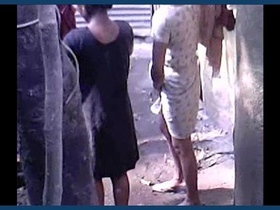 A young and seductive girl from a rural area reveals her curves while showering outdoors