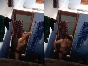 Hidden camera captures Indian girl taking a bath
