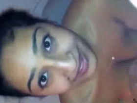 An enticing Indian woman performs a passionate oral sex act in this heated video