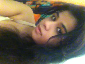 Tamil babe flaunts her big boobs and hairy pussy