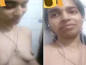 Busty Indian babe masturbates with her hands