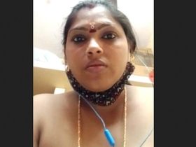 Elderly wife talks on video call with her partner