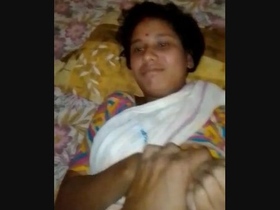 A village wife from India is roughly taken