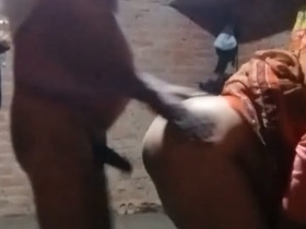 Middle-aged Indian woman engages in doggy style sex in rural setting