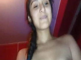 Attractive woman rides a massive black shaft