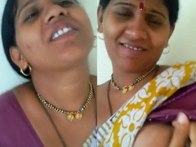 Indian aunt's large breasts on display