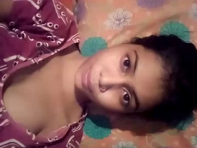A tantalizing video featuring an attractive Indian woman showcasing her ample bosom