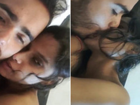 Desi couple enjoys passionate kissing in bedroom with soft music