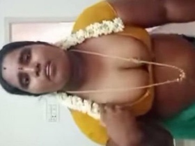 Indian aunty with huge boobs gets naughty