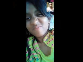 An Indian woman sensually pleasures herself with her fingers in a video