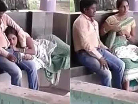 Aunty and her black partner engage in oral sex and fondle breasts in a public park