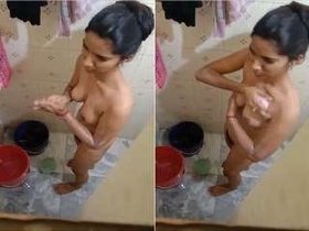 Hidden camera captures a stunning Indian babe soaking in the tub