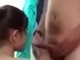 A cute girl pleases a man with her mouth in this video