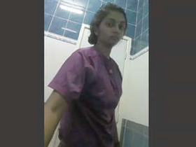 Steamy bathroom encounter with attractive woman captured on camera