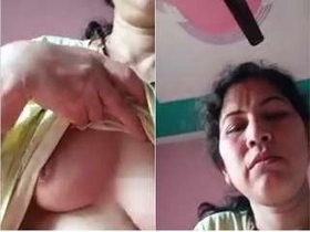 Horny Assami Budi flaunts her big tits in public