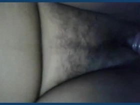 An Indian mature woman showcases her breasts and vagina in a sensual video