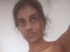 Tamil girl goes naked and pleasures herself with her fingers