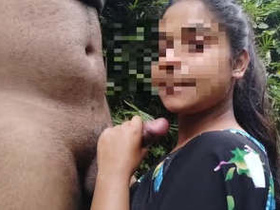 Busty Indian babe sucks and swallows in the open air