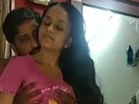A sensual Indian couple indulges in foreplay and lovemaking in a steamy video