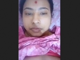 Indian wife proudly displays her large breasts