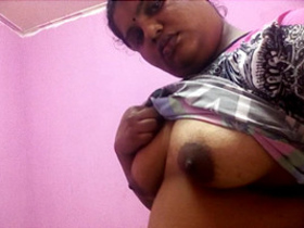 Indian aunt reveals her breasts to her spouse