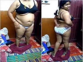 Watch a stunning Tamil wife in steamy action