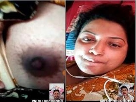 Indian bhabhi flaunts her breasts in a video call to her lover
