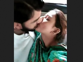 A mischievous Pakistani couple indulges in intimate activities inside a vehicle