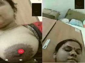 Telugu bhabhi flaunts her huge breasts in a steamy video