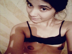 Watch a sweet young girl show off her natural body and breasts in a video