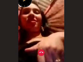 A lovely Indian woman reveals her breasts and vagina during a video call
