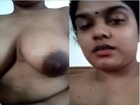 Budi's big boobs get a sensual massage in steamy video