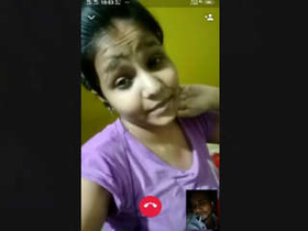 A charming Indian beauty reveals herself on a video chat