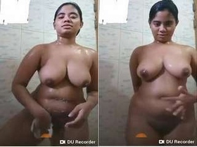 Urmi, the Indian girl, soaps up in the shower for video call