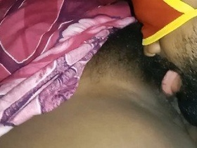 A Tamil housewife encounters intense pleasure during intimate moments in this heated recording