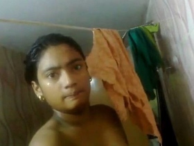 Desi girl takes sexy selfies in the bathroom