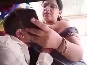 Tailor gives oral pleasure to auntie's breasts
