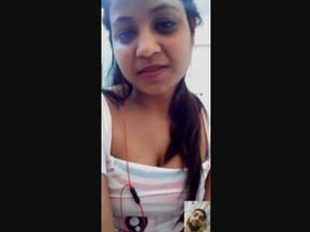 Indian beauty reveals her large breasts in part 2 of this sensual video