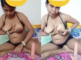 Indian housewife's religious ritual with a white sex toy and big breasts