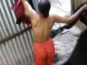 Desi bhabhi caught changing in bathroom by hidden camera